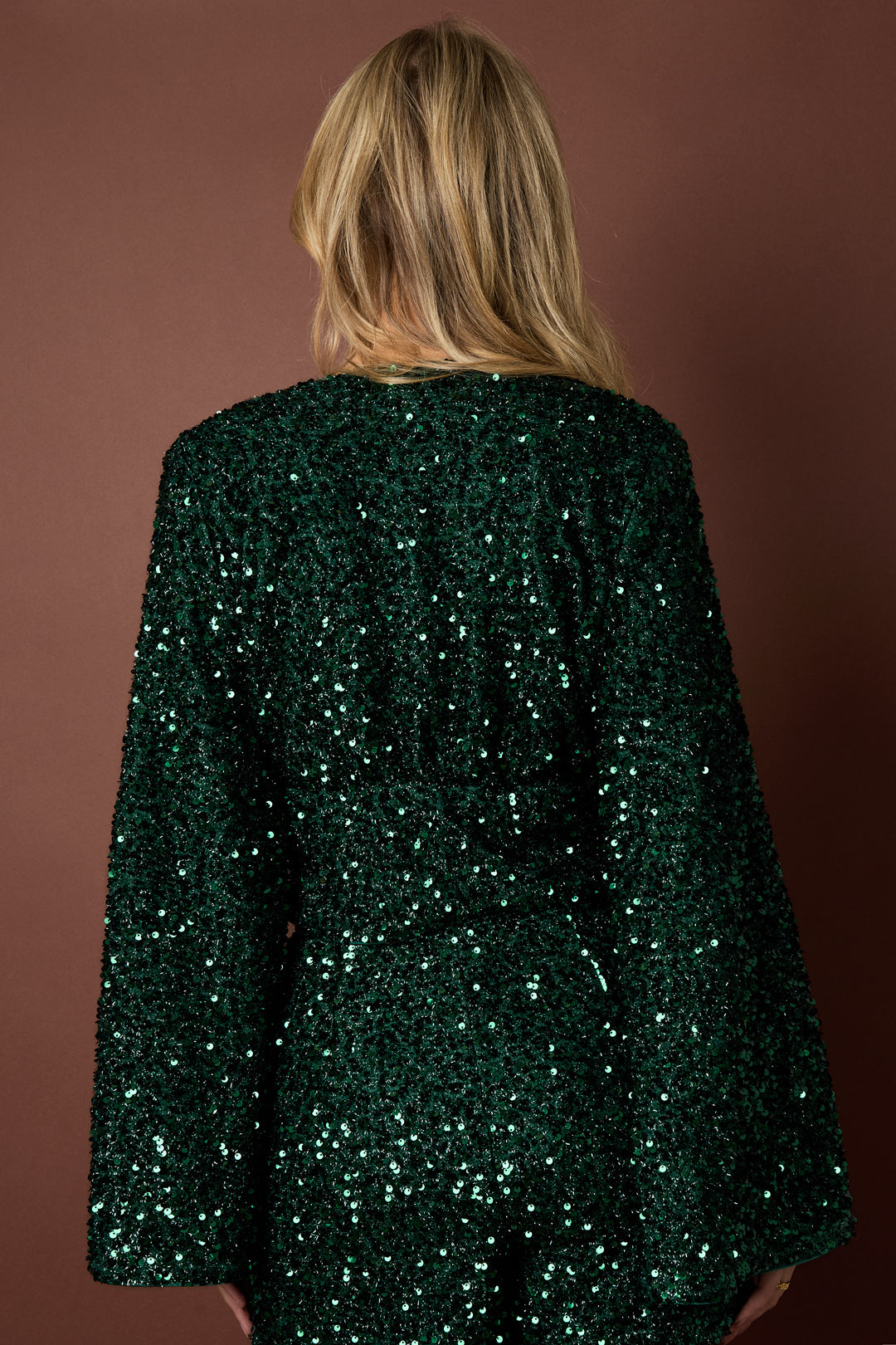 Dark green Livia long sleeve top with a fitted design styled in an outfit from Sorea Fashion.