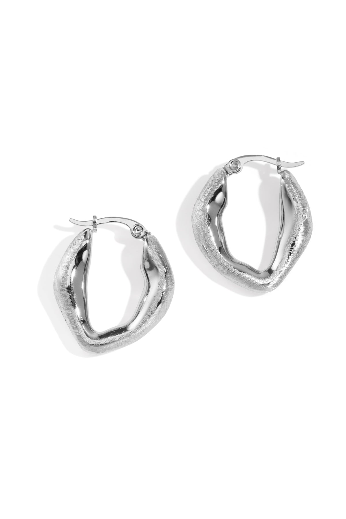 Minimalist silver hoop earrings with a smooth round shape displayed on a clean white background from Sorea Fashion.