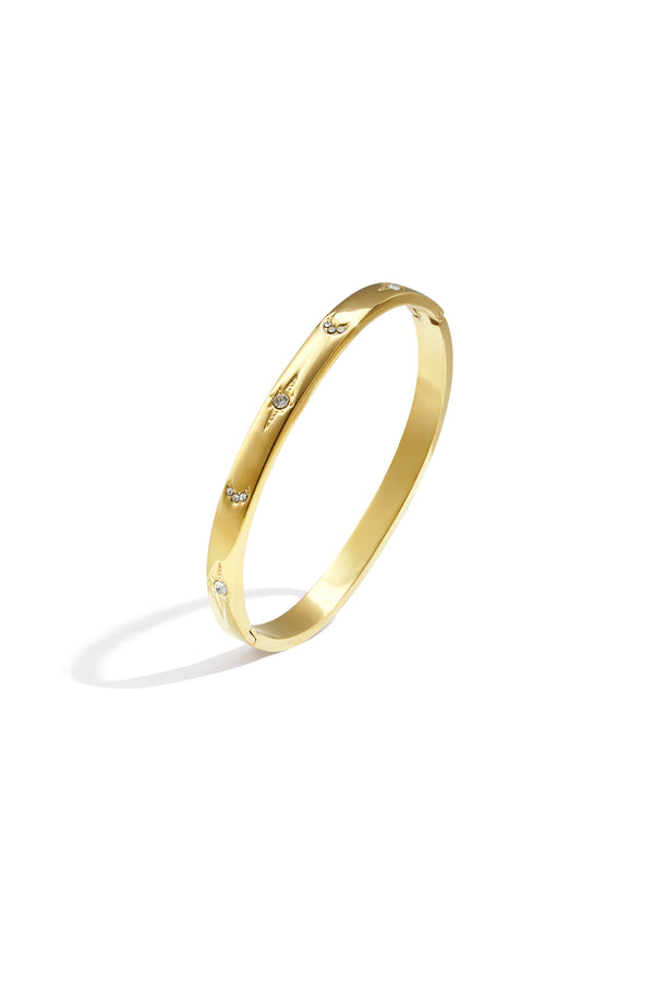 Gold Dotty bangle featuring a dotted textured design shown on a white background from Sorea Fashion.