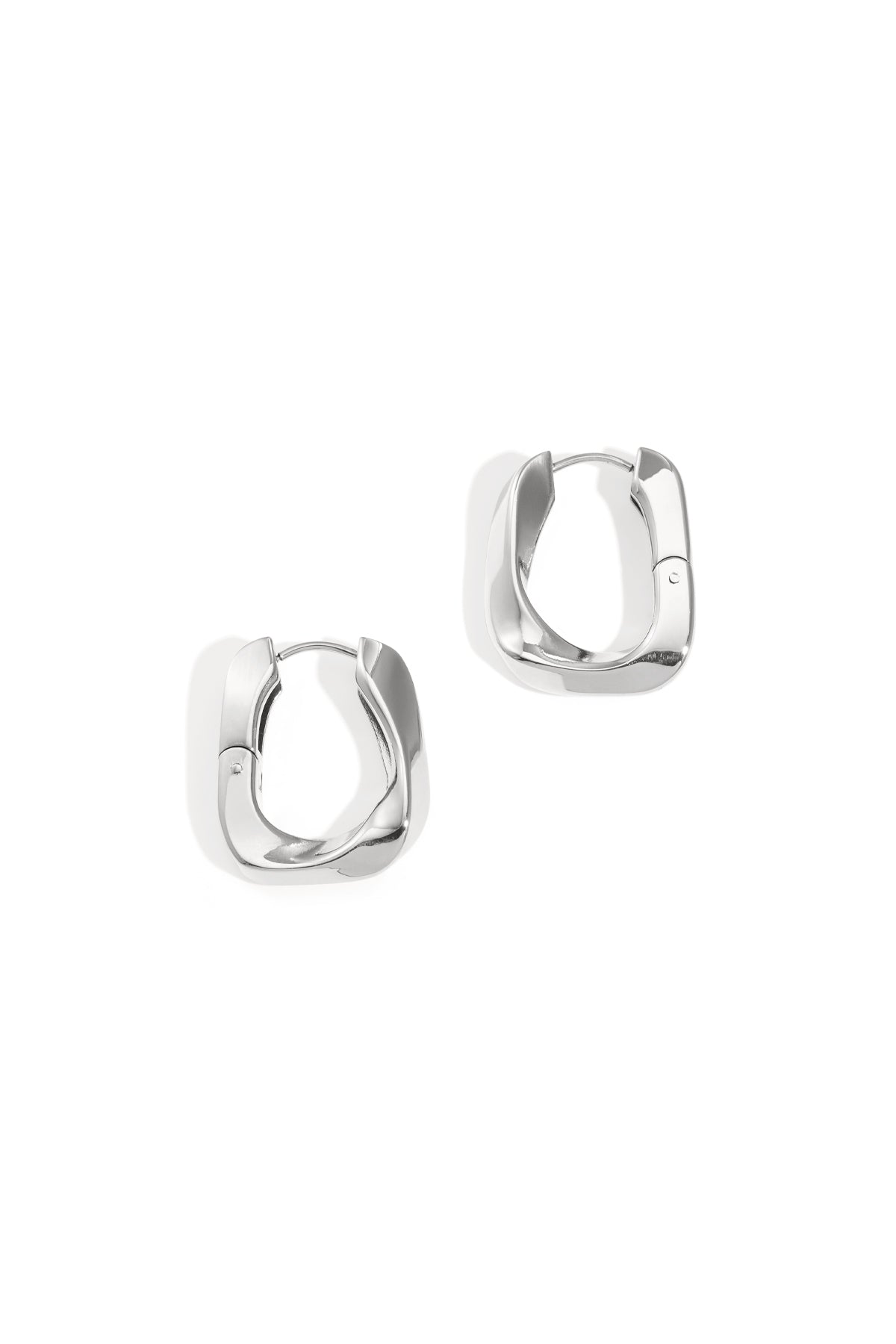 Silver Rhea earrings with a chunky squared hoop design displayed on a white background from Sorea Fashion.
