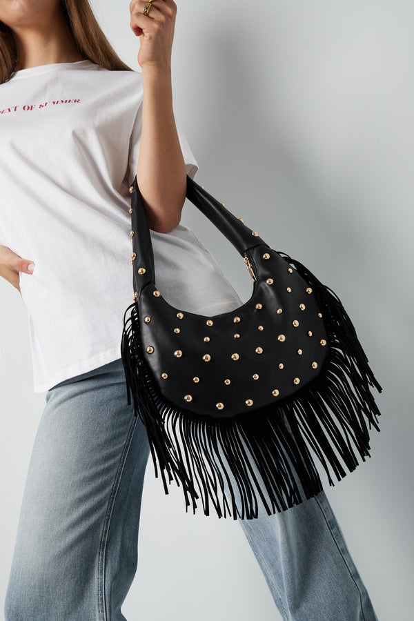 Black Sloane handbag with a slouchy silhouette styled in a modern casual look from Sorea Fashion.